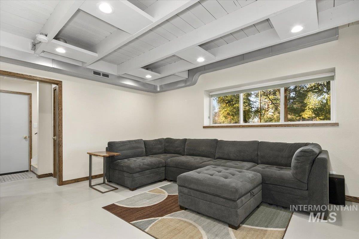 2518 Lancaster Drive Boise, ID 83702 - Photo 33 of 41 Living area with recessed lighting, beam ceiling, and finished concrete flooring