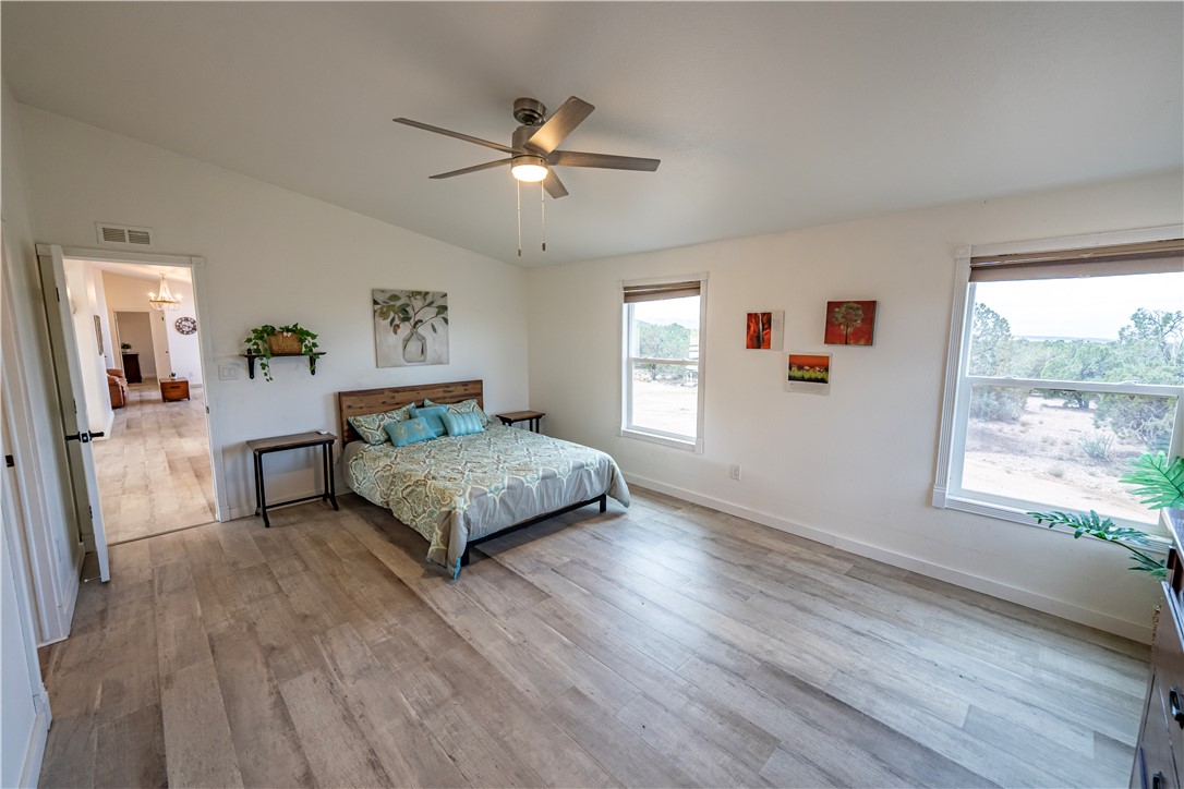 2765 North Silver Springs Road Kingman, AZ 86401 - Photo 37 of 60 a bedroom with a bed and window