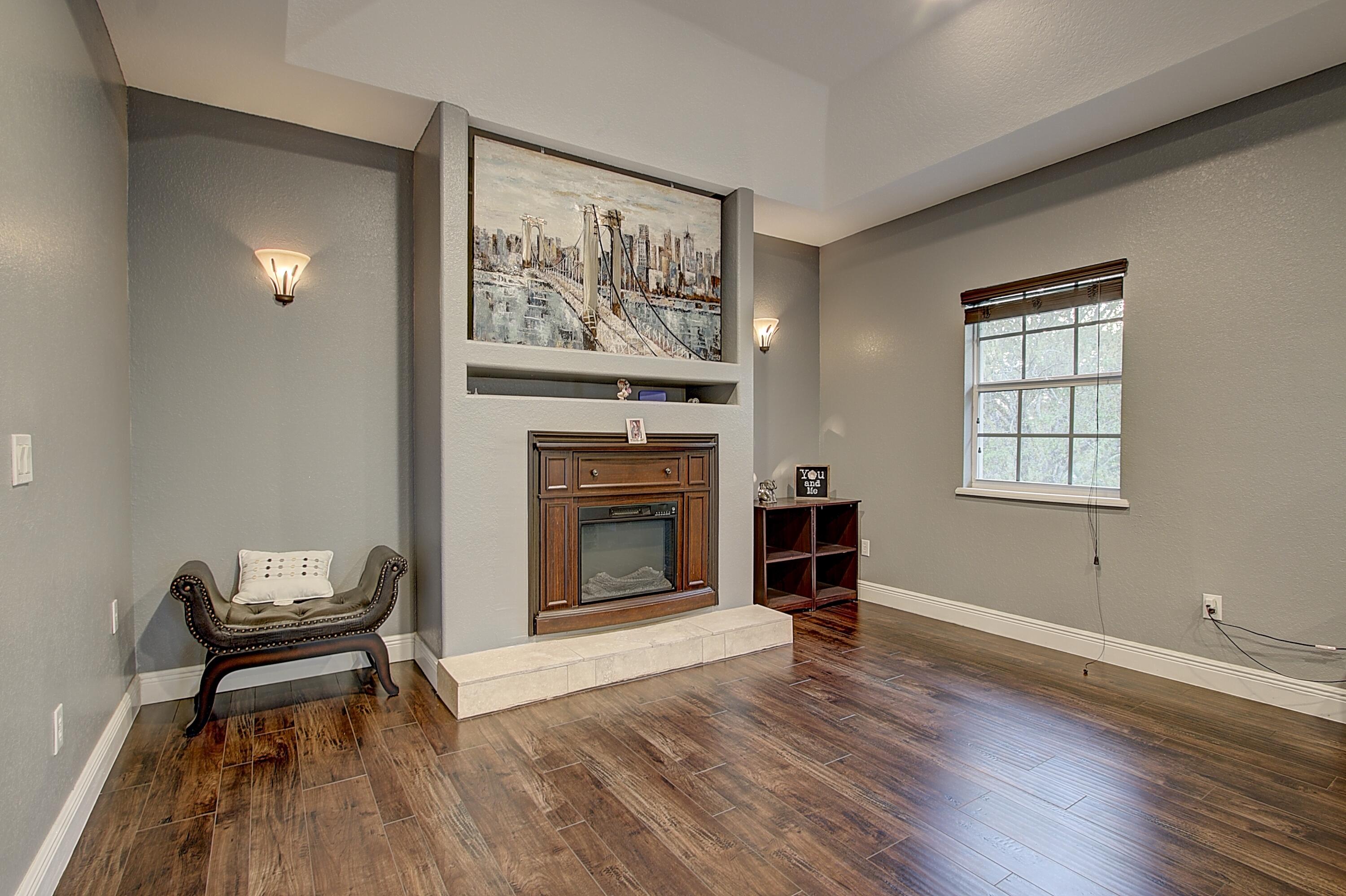 669 Howard Street Fort Pierce, FL 34982 - Photo 13 of 15 a living room with furniture and a fireplace