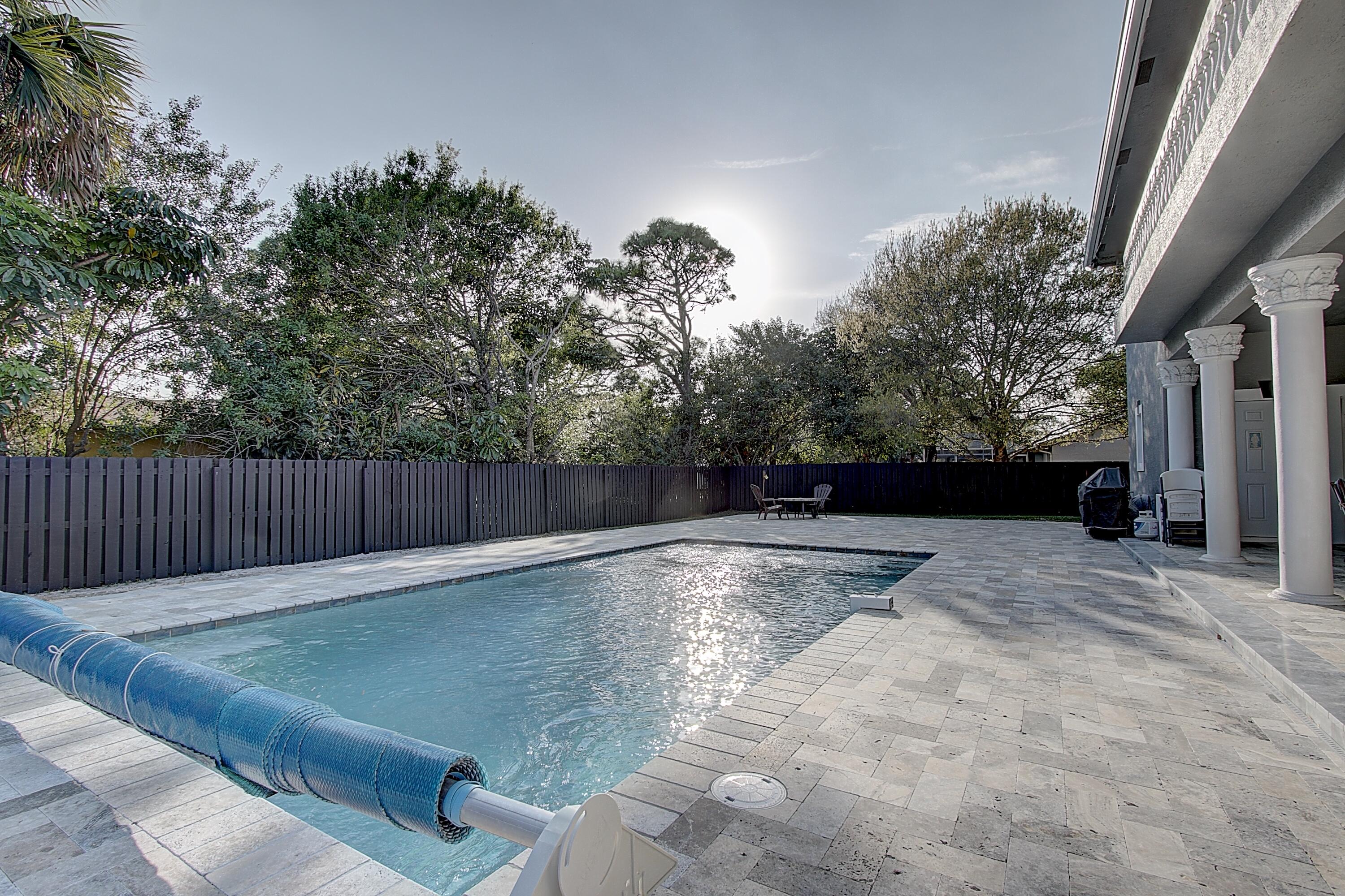 669 Howard Street Fort Pierce, FL 34982 - Photo 5 of 15 a view of backyard with green space