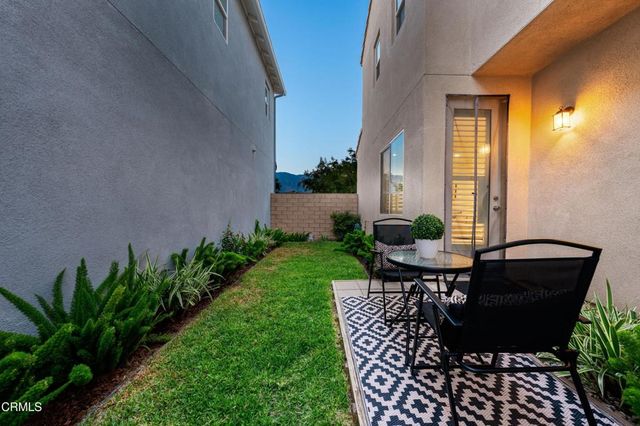 a workspace with furniture and window