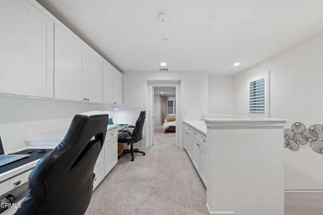 a room with a bed and a window