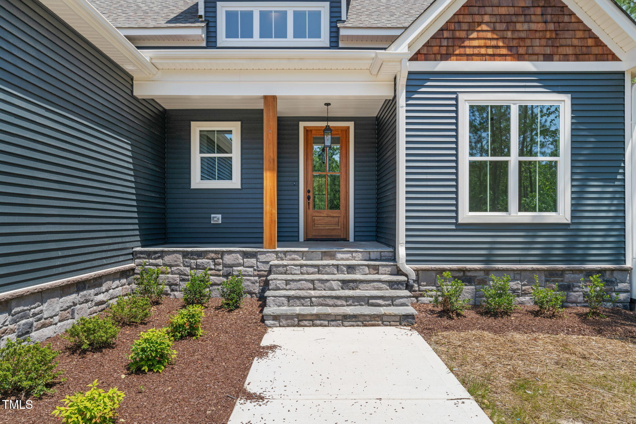 390 Pilot Ridge Road Zebulon, NC 27597 - Photo 2 of 41 a front view of a house