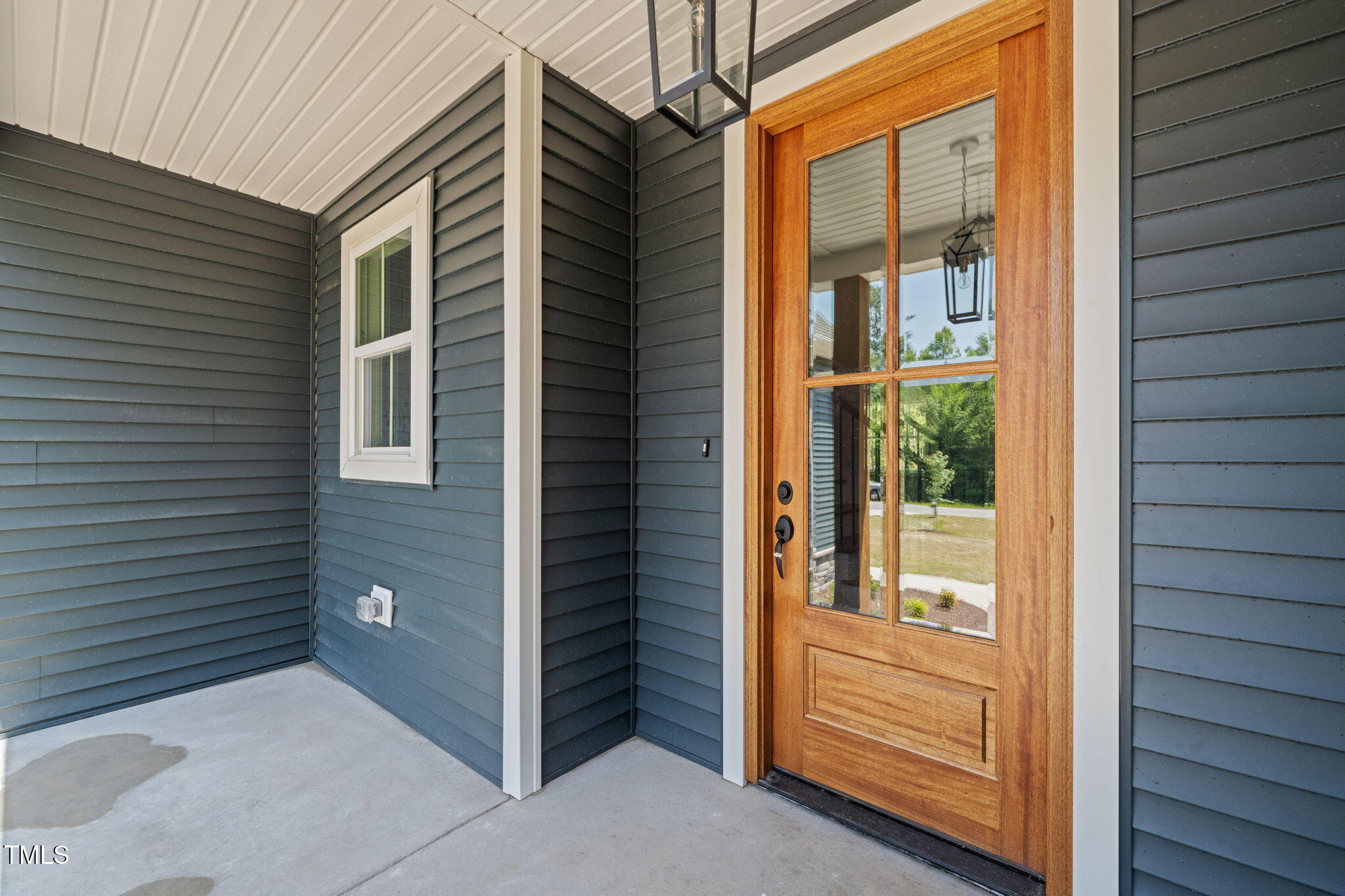 390 Pilot Ridge Road Zebulon, NC 27597 - Photo 3 of 41 a view of front door of house