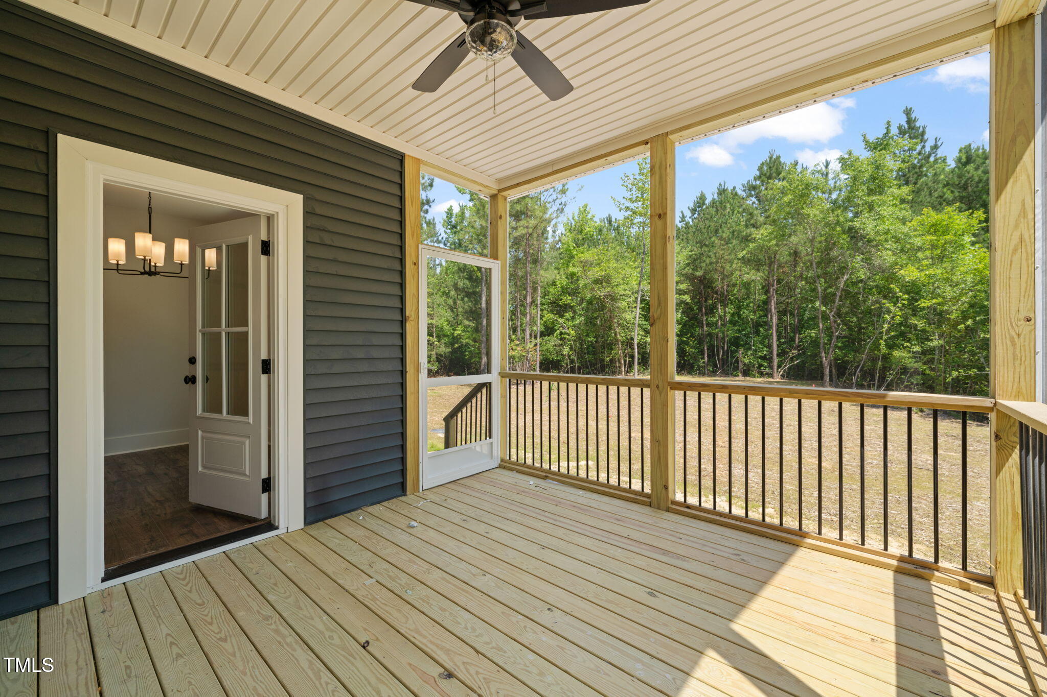 390 Pilot Ridge Road Zebulon, NC 27597 - Photo 31 of 41 a view of a balcony with wooden floor