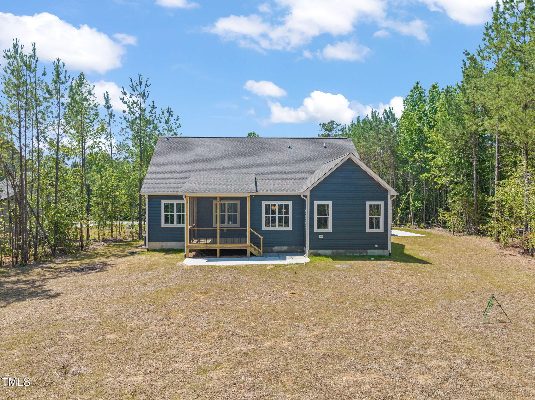 390 Pilot Ridge Road Zebulon, NC 27597 - Photo 32 of 41 a house with trees in the background