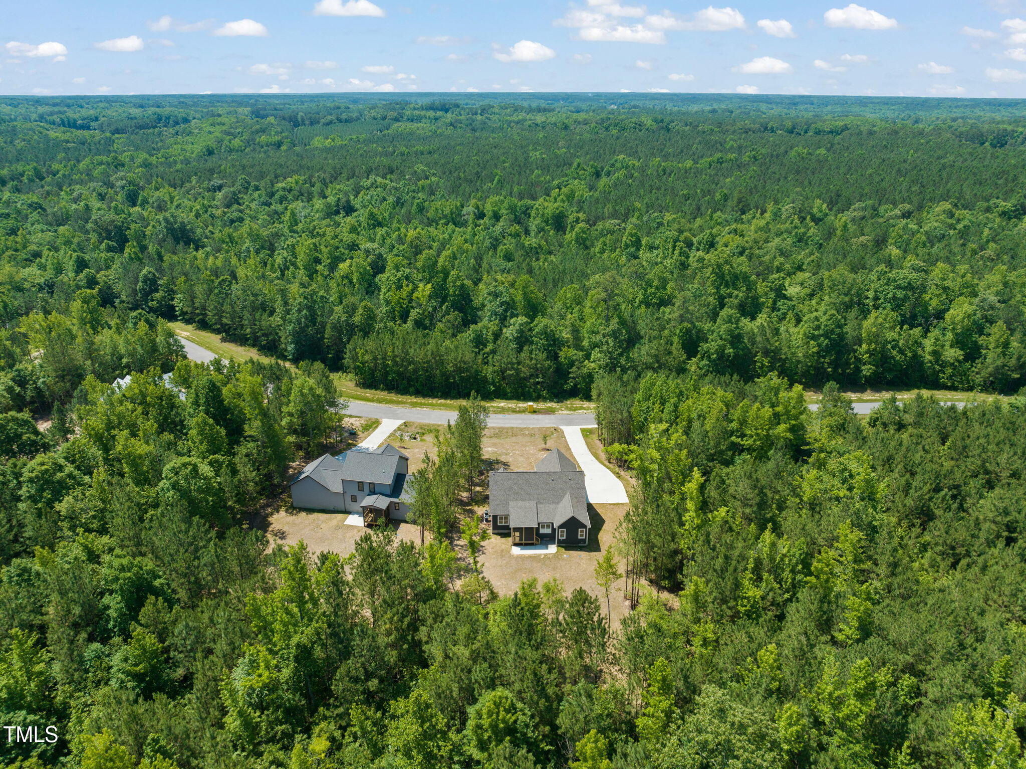 390 Pilot Ridge Road Zebulon, NC 27597 - Photo 35 of 41 an aerial view of a house with a yard