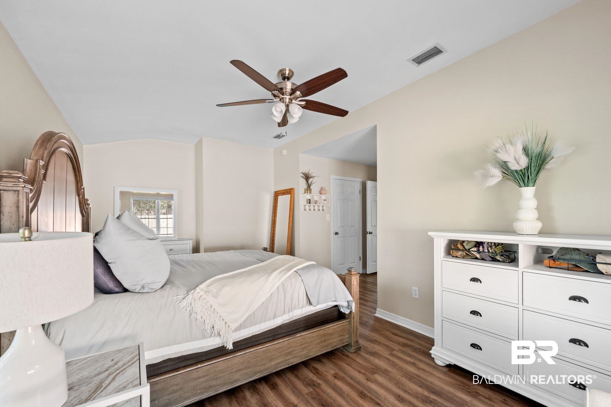 110 Ferncliff Circle Daphne, AL 36526 - Photo 21 of 40 Bedroom featuring lofted ceiling, dark wood-type flooring, baseboards, and ceiling fan