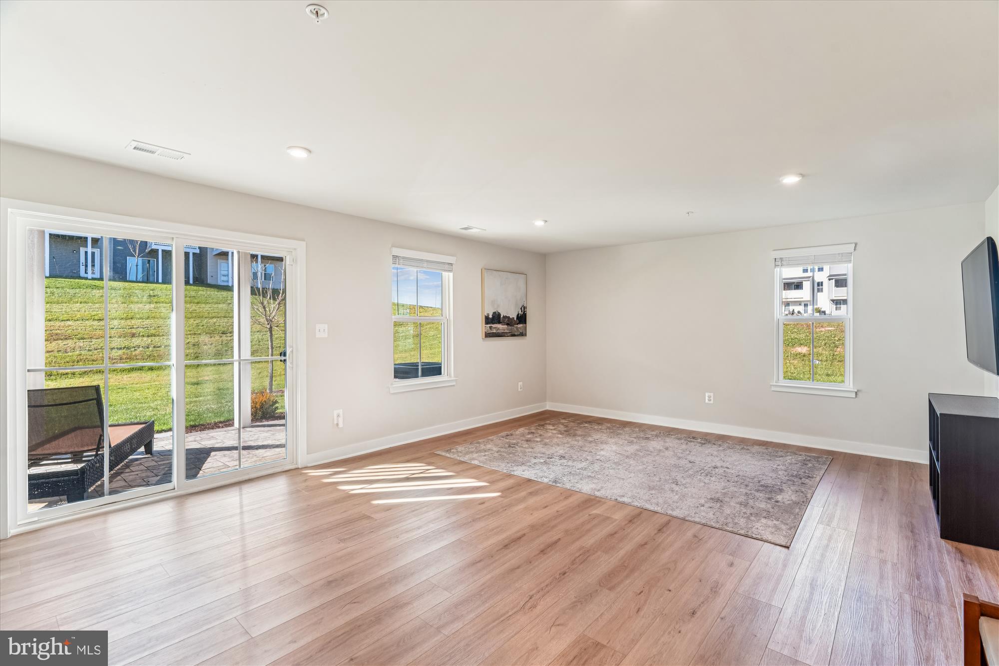 7700 Cultivator Road Laurel, MD 20723 - Photo 21 of 44 Entry Level Rec. Room w/ Access to Flagstone Patio