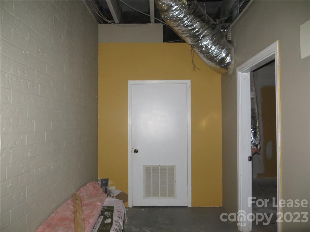3744-a B Nc Highway Denver, NC 28037 - Photo 7 of 8 a view of a hallway with painted walls