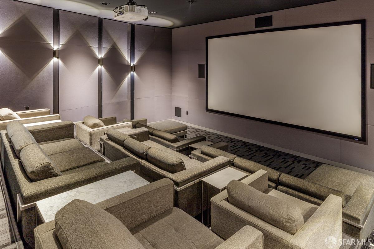 318 Main Street, Unit 4E San Francisco, CA 94105 - Photo 32 of 50 a living room with furniture and a rug