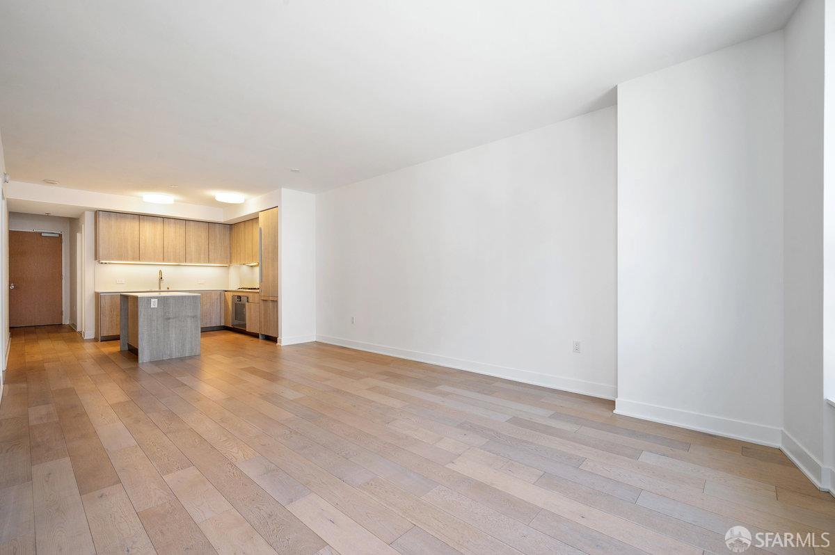 318 Main Street, Unit 4E San Francisco, CA 94105 - Photo 10 of 50 a view of a kitchen with a sink and a refrigerator