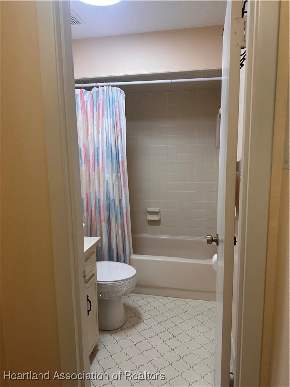 5007 Granada Boulevard Sebring, FL 33872 - Photo 12 of 15 a bathroom with a toilet and a shower