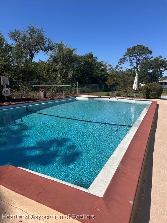 5007 Granada Boulevard Sebring, FL 33872 - Photo 15 of 15 a view of swimming pool with a yard