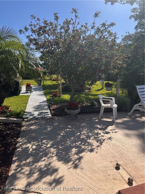 5007 Granada Boulevard Sebring, FL 33872 - Photo 6 of 15 a view of a park with large trees