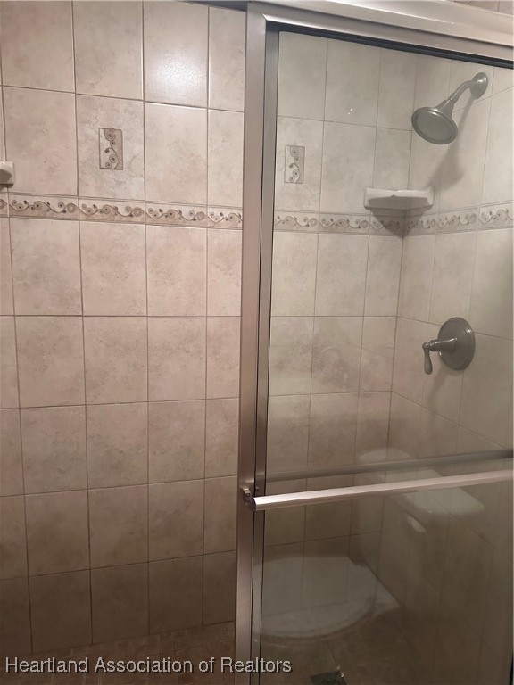 5007 Granada Boulevard Sebring, FL 33872 - Photo 8 of 15 a bathroom with a shower