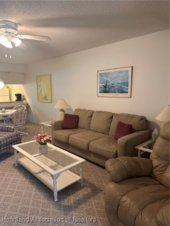 5007 Granada Boulevard Sebring, FL 33872 - Photo 10 of 15 a living room with furniture and a flat screen tv