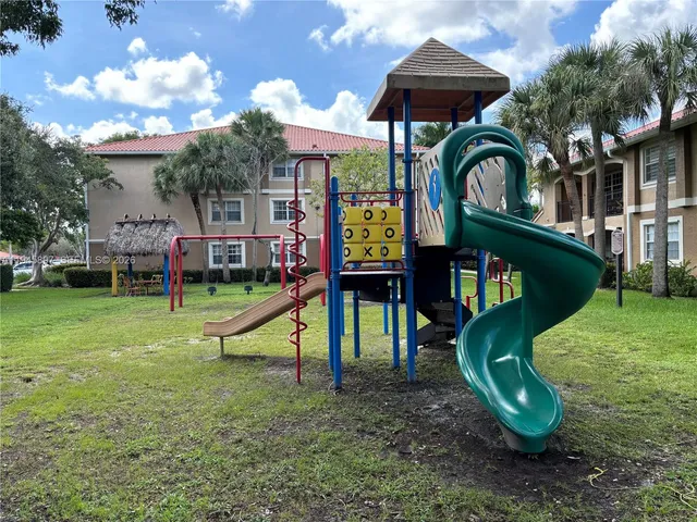 a view of a house with a park