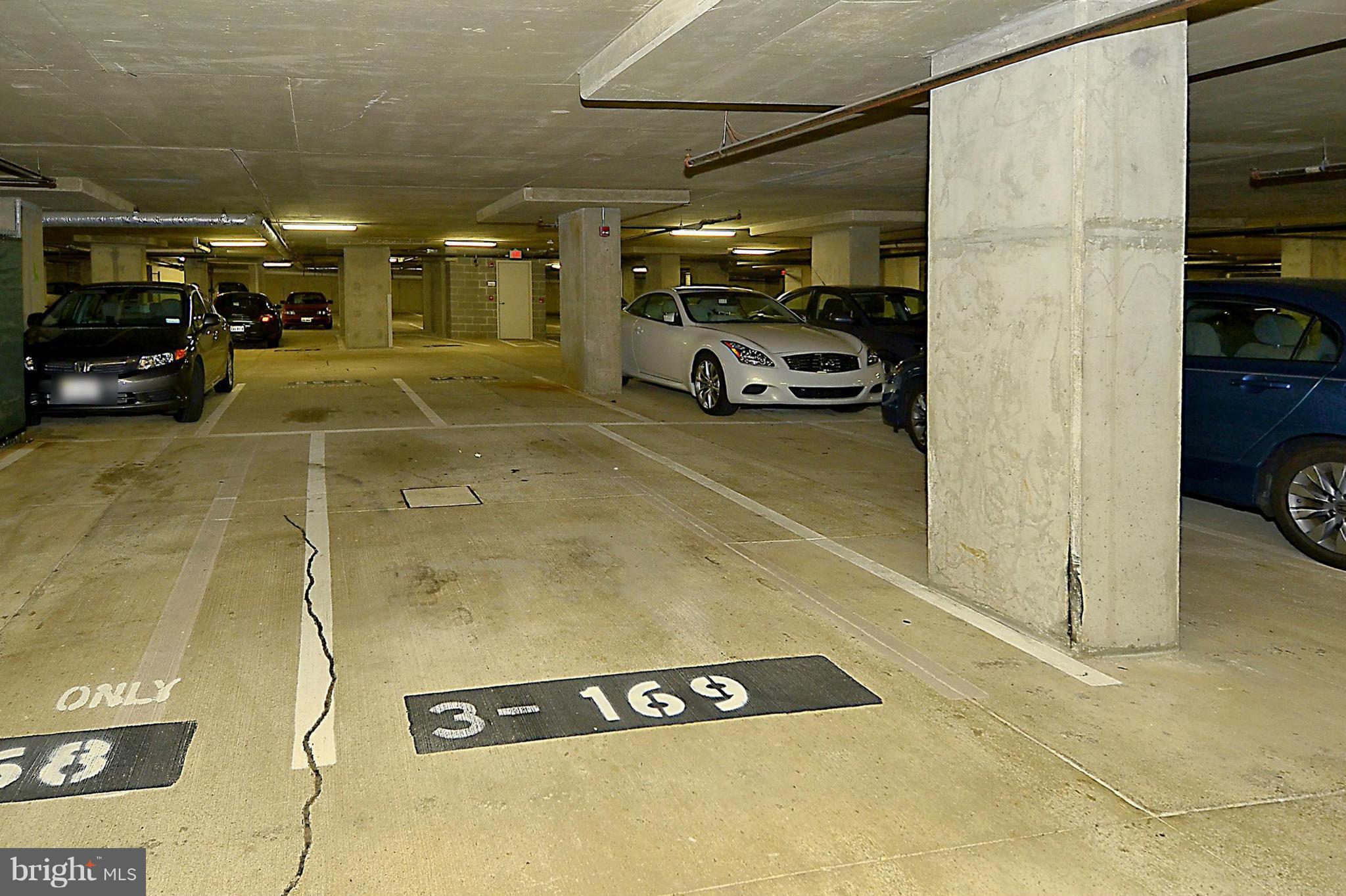 851 North Glebe Road, Unit 915 Arlington, VA 22203 - Photo 18 of 30 a view of parking garage with cars