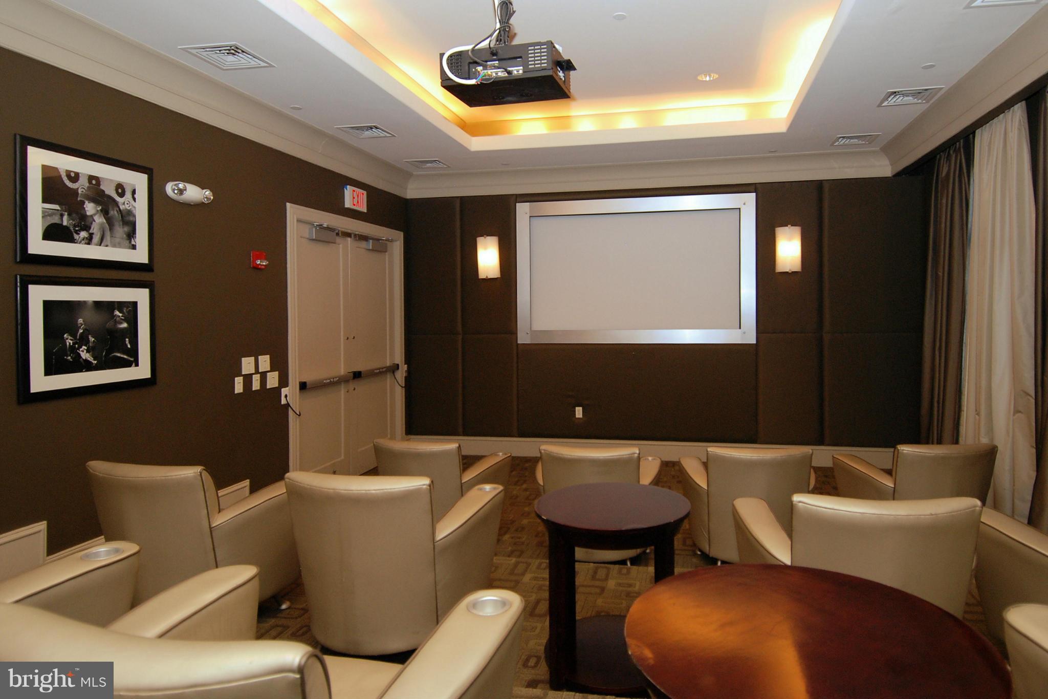 851 North Glebe Road, Unit 915 Arlington, VA 22203 - Photo 24 of 30 a living room with furniture and a flat screen tv