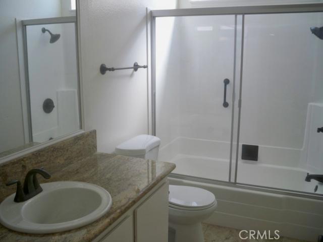 23892 Vía El Rocio Mission Viejo, CA 92691 - Photo 3 of 6 a bathroom with a sink and a mirror