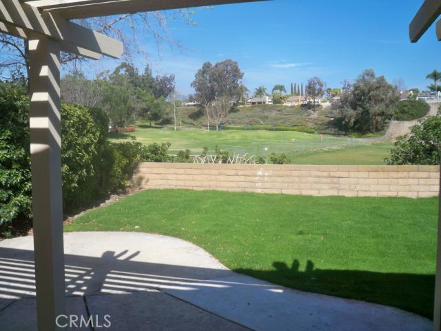 23892 Vía El Rocio Mission Viejo, CA 92691 - Photo 6 of 6 a view of a yard with a trampoline