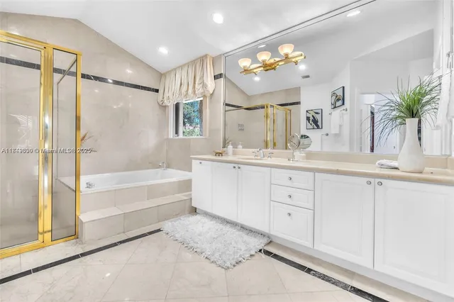a bathroom with a sink and tub