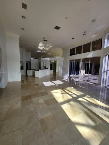 a swimming pool with outdoor seating and yard