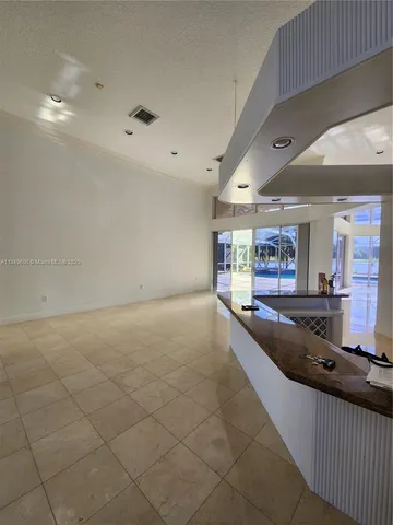 a view of a room with natural light