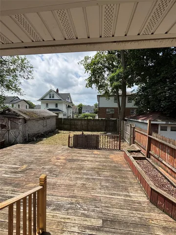 a view of a balcony with chairs