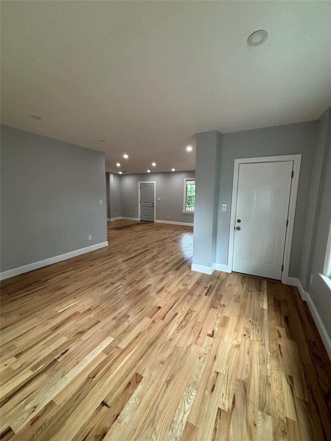 219-06 101st Avenue Queens, NY 11429 - Photo 7 of 19 a view of an empty room and glass door