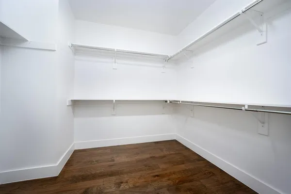 a view of an empty walk in closet