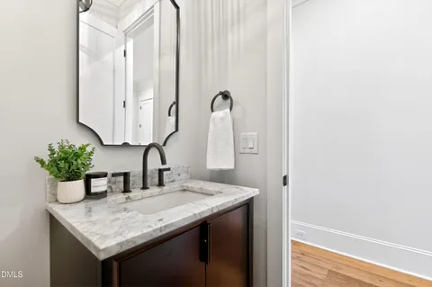 a utility room with sink dryer and washer