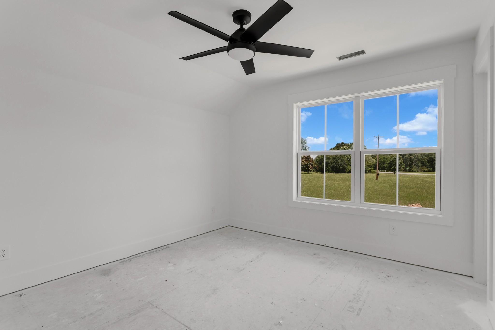 1171 Abiff Road Bon Aqua, TN 37025 - Photo 26 of 45 an empty room with a window and a fan