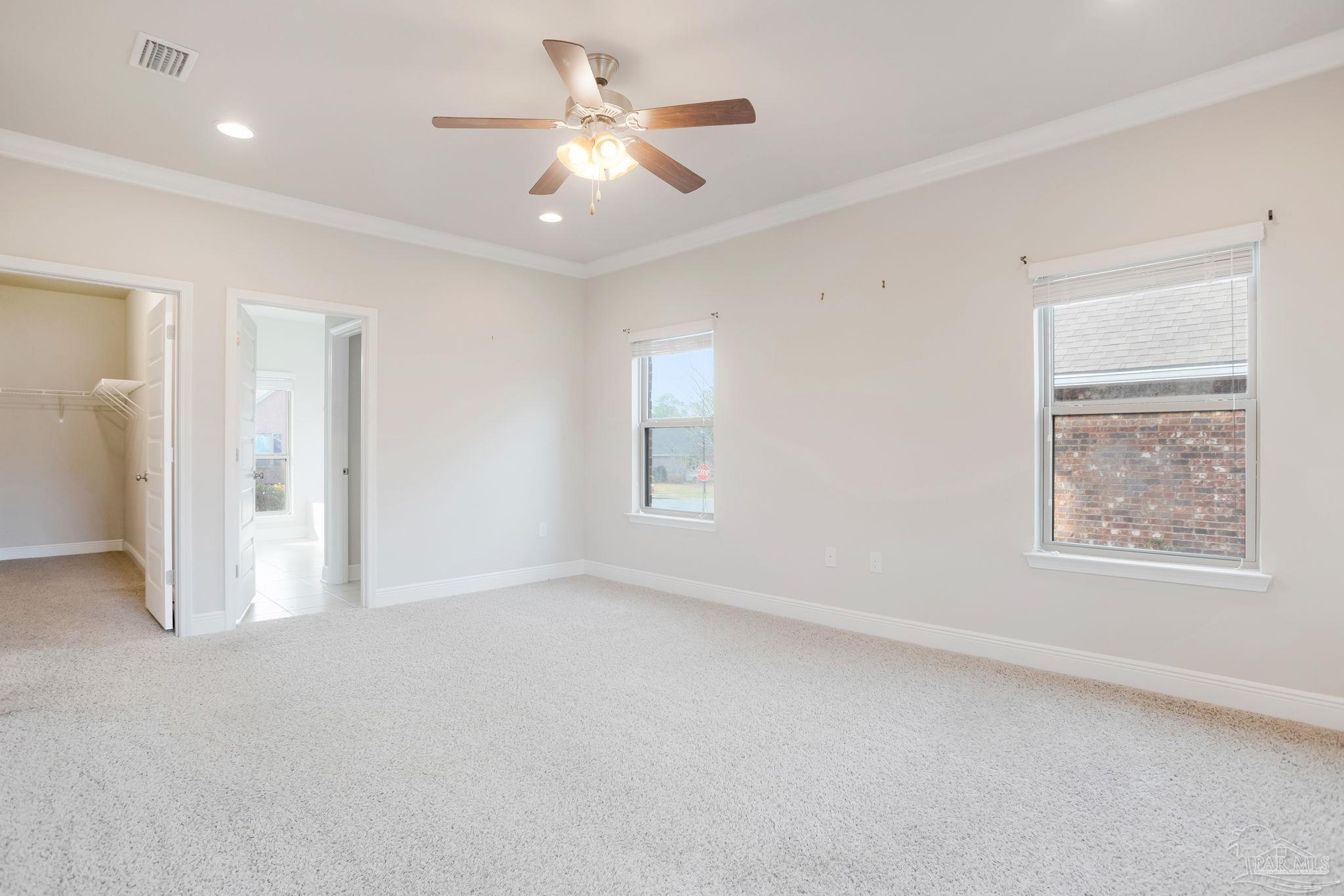 8016 Woodbrook Road Pensacola, FL 32526 - Photo 19 of 52 a view of an empty room with a window