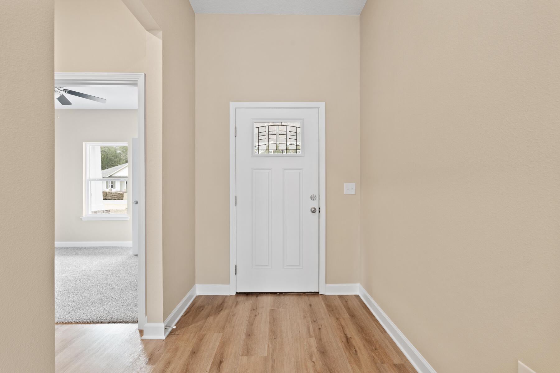 5331 Old River Road Baker, FL 32531 - Photo 2 of 13 a view of a hallway with wooden floor