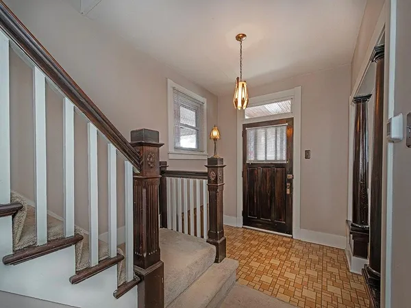 a view of a hallway with entryway