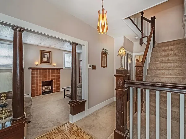 a view of front door with stairs
