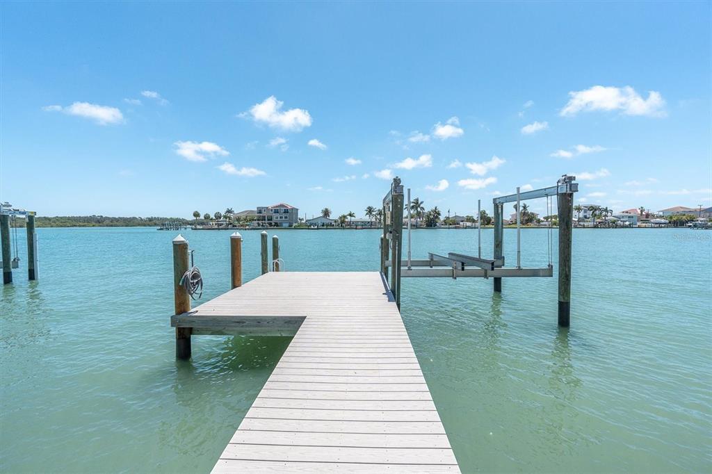 575 Crystal Drive Madeira Beach, FL 33708 - Photo 15 of 16 a park view with a table & chairs