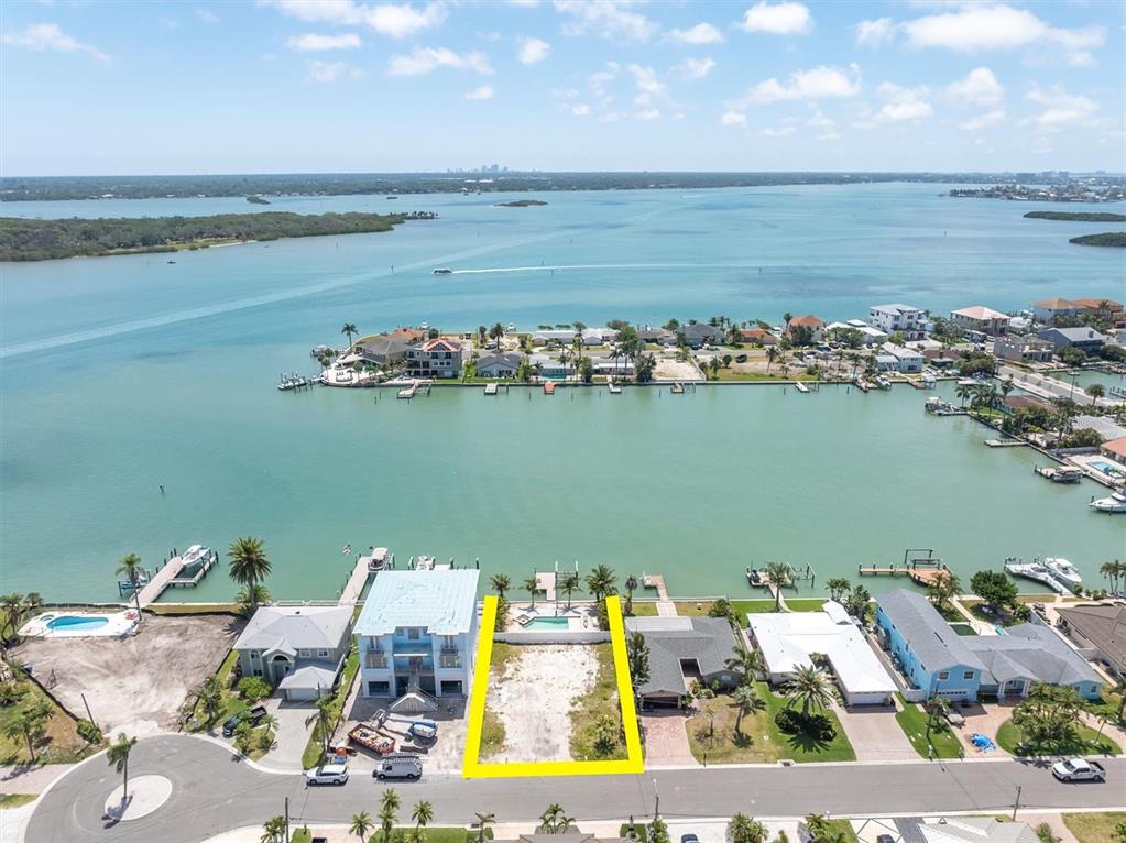 575 Crystal Drive Madeira Beach, FL 33708 - Photo 2 of 16 an aerial view of ocean and residential houses with outdoor space