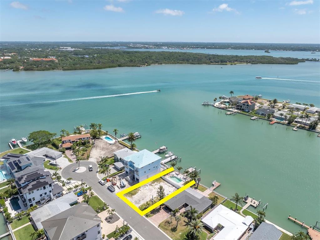 575 Crystal Drive Madeira Beach, FL 33708 - Photo 3 of 16 a view of a lake with a mountain