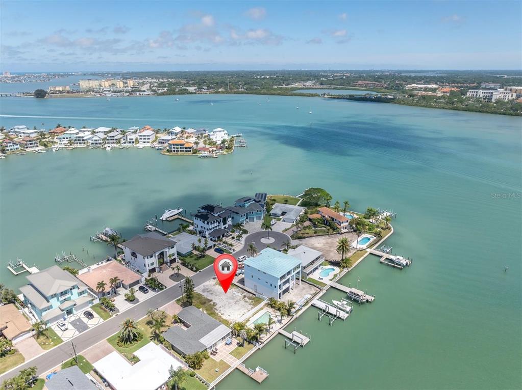 575 Crystal Drive Madeira Beach, FL 33708 - Photo 4 of 16 an aerial view of a house with outdoor seating
