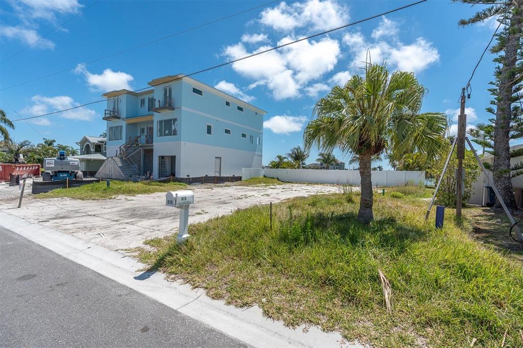 575 Crystal Drive Madeira Beach, FL 33708 - Photo 9 of 16 a view of a yard with a house