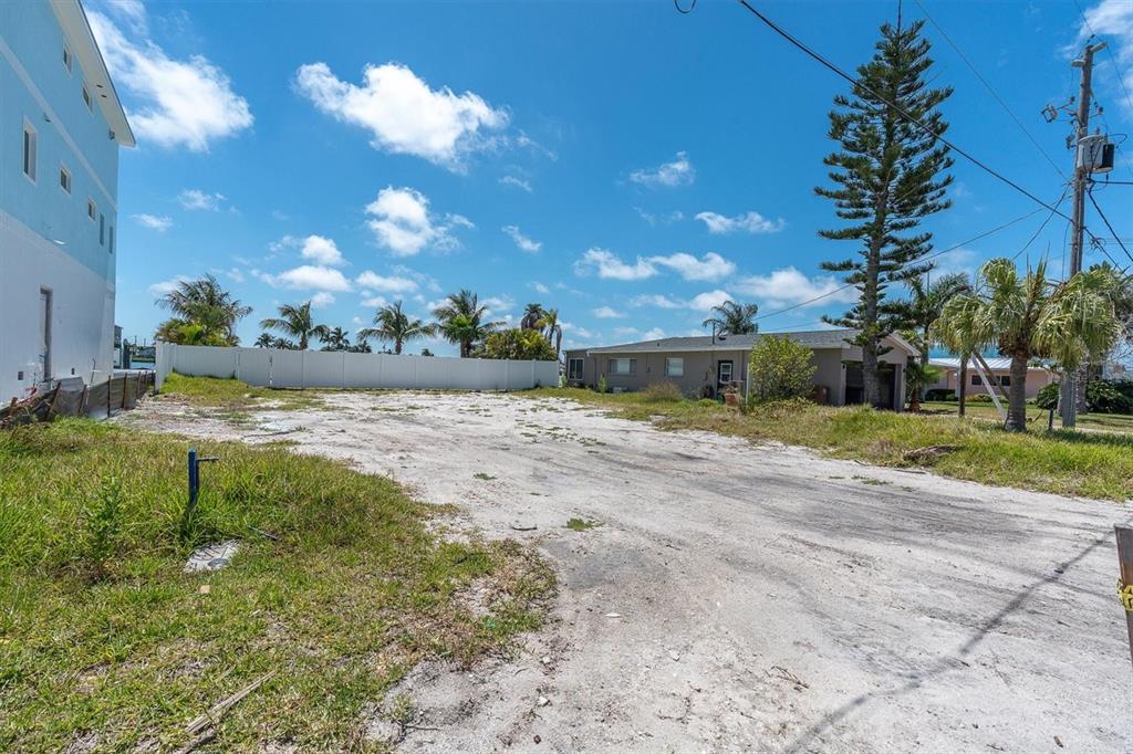 575 Crystal Drive Madeira Beach, FL 33708 - Photo 10 of 16 a view of a lake with a yard