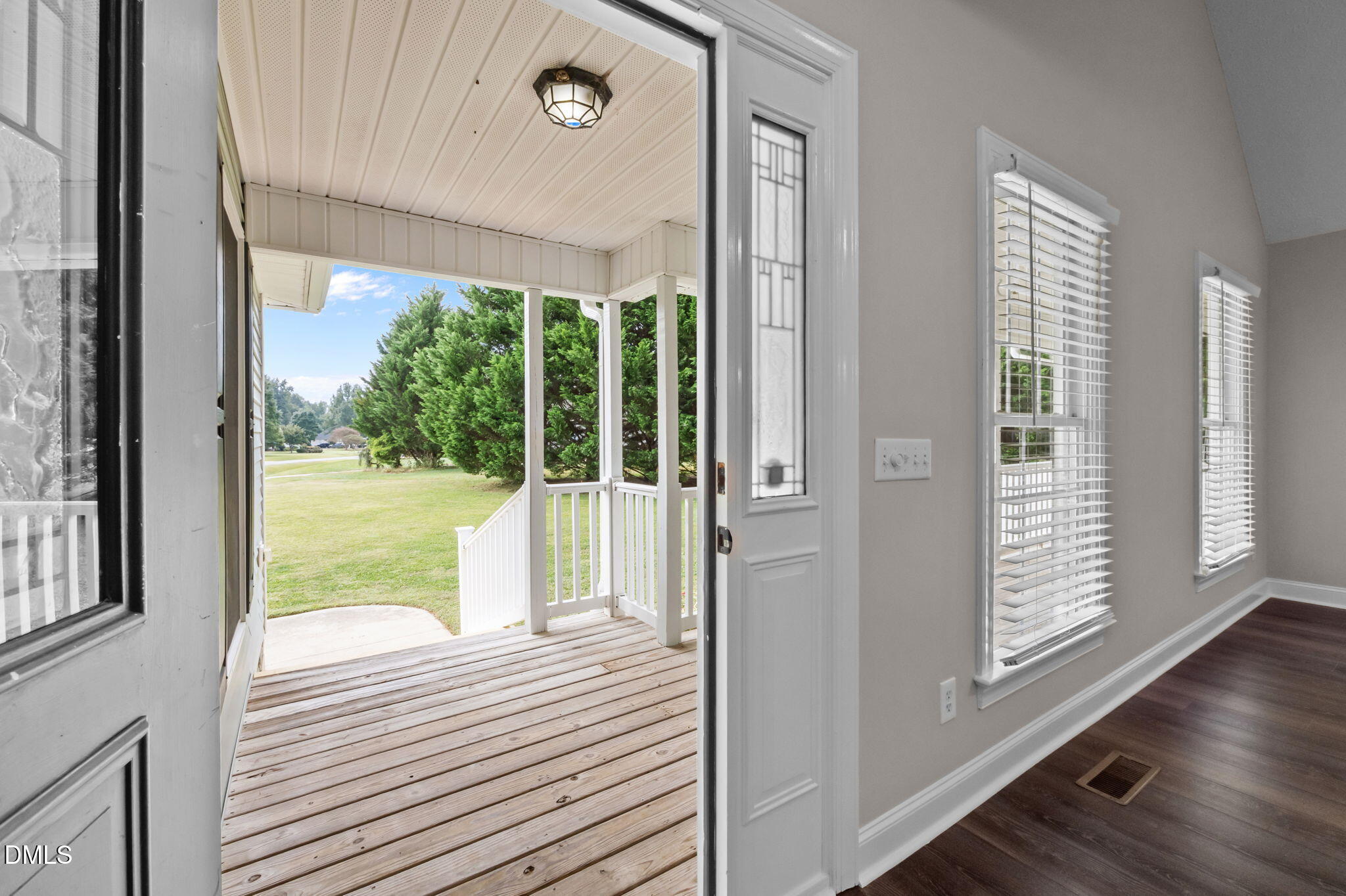 427 Fletcher Ridge Road Timberlake, NC 27583 - Photo 6 of 42 a view of a balcony with wooden floor