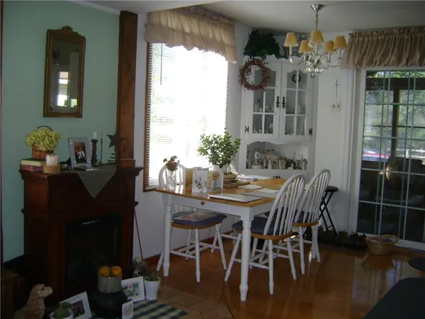 a room with furniture and a large window