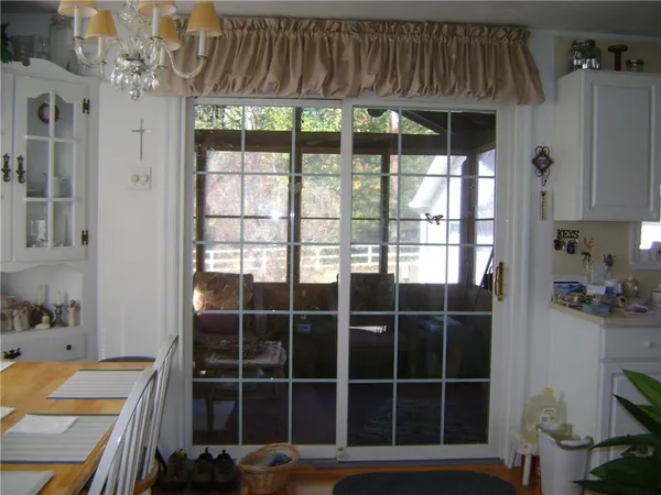a room with a sink and cabinets