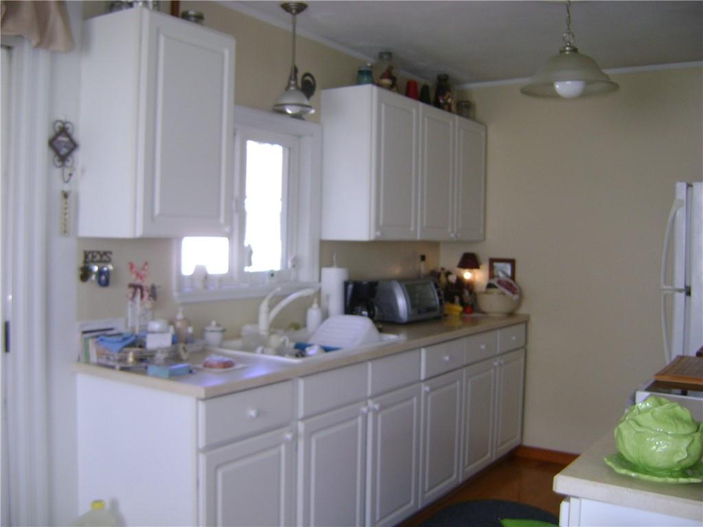 2092 McArthur Road Jamestown, PA 16134 - Photo 15 of 48 a kitchen with sink cabinets and window