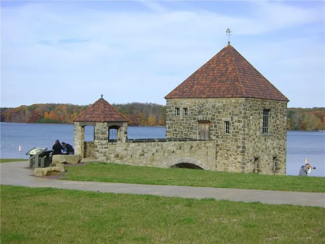 a view of a lake with a yard