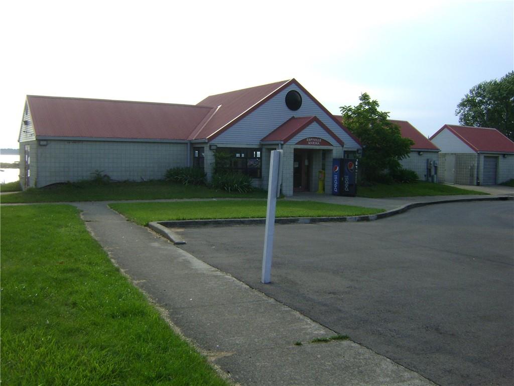 2092 McArthur Road Jamestown, PA 16134 - Photo 48 of 48 a front view of a house with a yard and garage